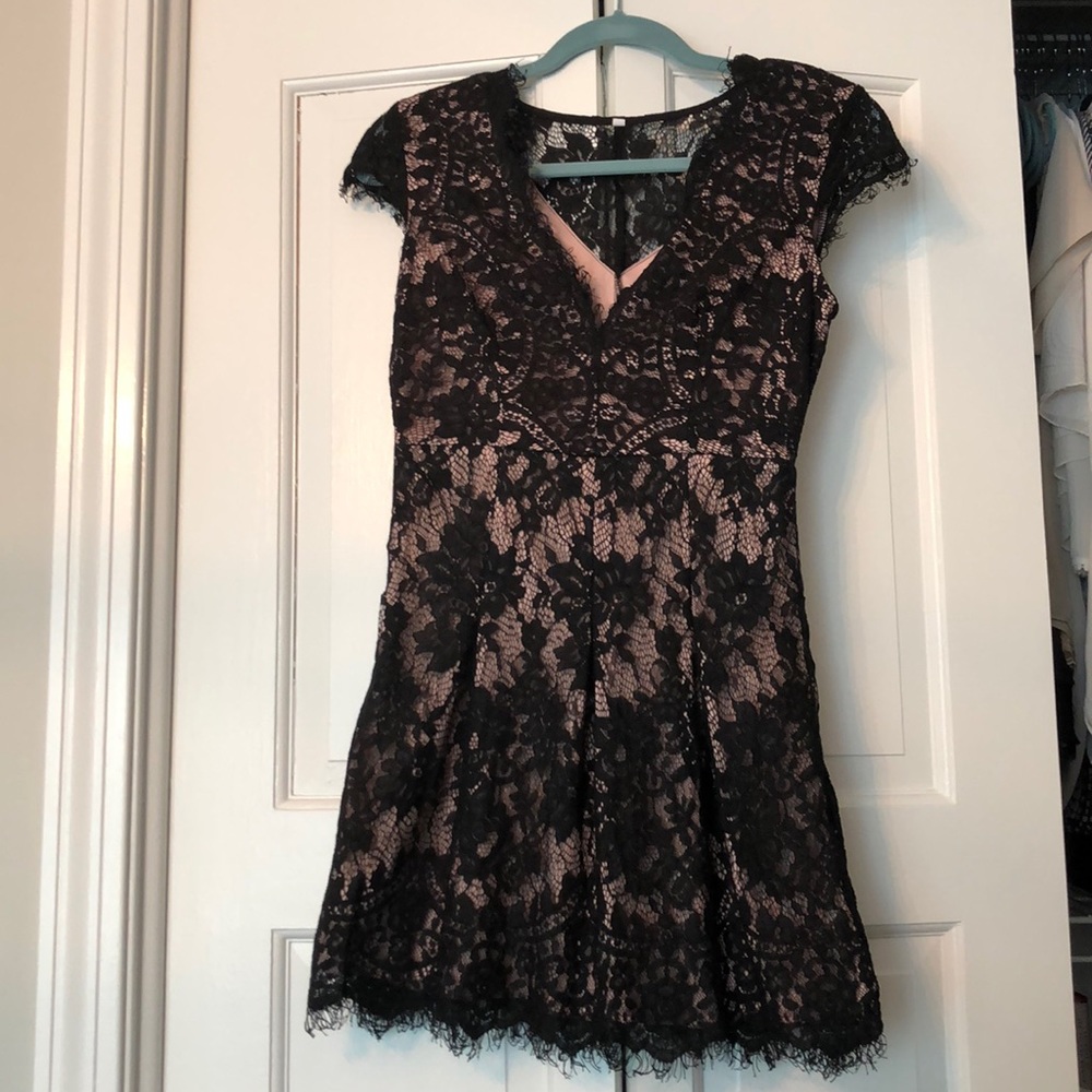 Raw edge lace v-neck mini dress with blush lining